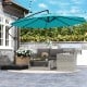 Turquoise 10 feet offset hanging umbrella with base, providing sun protection for outdoor patio relaxation.