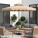10-foot beige patio umbrella with push-button tilt and crank, providing broad shade for outdoor gatherings.