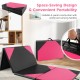 Folding exercise mat in black and pink, featuring a four-panel design and carrying handles for easy transport and.