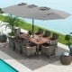 10-piece patio wicker dining set with gray cushions and a large double-sided umbrella, perfect for outdoor gatherings.