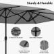 Close-up of the 15-foot double-sided patio umbrella's 12-rib iron structure and safe metal stopper for durability.
