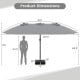 15-foot double-sided patio umbrella dimensions with a weighted base, ideal for the 10-piece wicker dining set.
