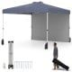10x10 ft gray pop-up canopy tent with sidewall, wheeled bag, and accessories for easy setup and sun protection.