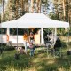 Pop up canopy tent in white, providing sunshade for outdoor activities like camping and picnics, with adjustable height.
