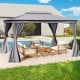 Patio gazebo with double roof, gray privacy curtains, and mesh netting, ideal for outdoor relaxation by the pool.