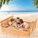 Kids wooden sandbox with two foldable bench seats, made of fir wood, perfect for 3-4 children to play and dig.