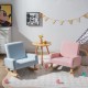 Kids rocking chair in blue with solid wood legs, designed for ages 3-5, perfect for reading and relaxation.