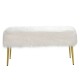Upholstered faux fur vanity stool with golden legs, offering comfort and style for makeup rooms or extra seating.
