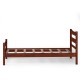 Twin size platform bed frame in walnut with solid pine wood, featuring slat support and ample under-bed storage space.