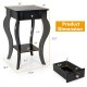 2-tier black end table with drawer and shelf, featuring streamlined legs, perfect for living room or bedroom use.