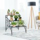3-tier black metal plant stand with widened grid shelf, ideal for indoor and outdoor plant display and storage.
