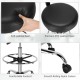 Swivel drafting chair with adjustable foot ring and soft-padded seat, upholstered in black PVC leather for comfort.