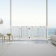 Freestanding 24-inch white wooden pet gate with 360° hinges, ideal for small dogs and versatile placement in your home.