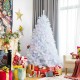 6 feet artificial Christmas tree with iridescent branch tips, surrounded by colorful gifts, perfect for festive home.