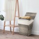 Handwoven gray laundry hamper with removable liner, flip lid, and non-slip foot pads for stability in any room.