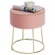 Round pink velvet footrest stool with gold metal frame, ideal as a sitting stool or side table for modern decor.