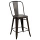 Industrial metal counter stool with removable backrest, solid steel construction, and elmwood seat for kitchen or pub.