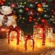 Decorative lighted gift boxes with red bows and 60 LED lights, perfect for creating a warm holiday ambiance indoors or.