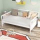 White full-size daybed frame with guardrails, featuring pillows and ample under-bed storage for versatile use.