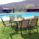 Set of 6 stackable patio dining chairs with curved armrests and breathable fabric, perfect for outdoor dining.