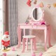 Pink kid vanity table set with oval rotatable mirror, sturdy MDF, and spacious storage for young girls' essentials.