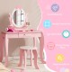Pink kid vanity table set with oval rotatable mirror, sturdy MDF construction, and roomy storage space for young girls.