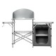 Foldable outdoor BBQ grilling table with a windscreen, featuring a sturdy design and ample storage space for cooking.