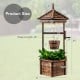 Rustic wooden wishing well planter with adjustable bucket, made from carbonized fir wood, ideal for outdoor gardens.