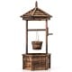 Rustic wooden wishing well planter with adjustable bucket, carbonized fir wood, ideal for indoor and outdoor plant.