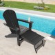 Black HDPE Adirondack chair with retractable ottoman, perfect for outdoor relaxation by the poolside.