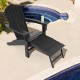 Black HDPE Adirondack chair with retractable ottoman, showcasing a spacious ergonomic seat for ultimate outdoor comfort.