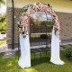 Steel garden arch with a 2-seat bench, featuring a floral design and trellis for climbing plants, perfect for outdoor.