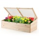 Wooden garden portable greenhouse with transparent PVC lid, ideal for cultivating flowers and extending growing seasons.