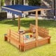 Kids wooden sandbox with canopy and two bench seats, made of cedar wood, perfect for outdoor play and relaxation.