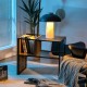 C-shaped side table with oak top and black steel frame, designed for easy access to snacks and books while saving space.