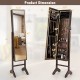 Standing jewelry cabinet with full-length mirror, ample storage, lockable door, and soft velvet lining for protection.
