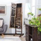 Standing jewelry cabinet with full-length mirror, ample storage, and lockable door, perfect for bedroom or living room.