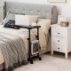 C-shape sofa side table in black showcasing spacious tabletop, storage basket, and flexible casters for easy mobility.