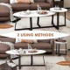 Modern faux marble nesting coffee table set with oval and round tables, ideal for living room or office use.