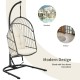 Beige hanging wicker egg chair with stand, showcasing its modern design and anti-slip foot pads for indoor and outdoor.
