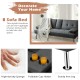 Convertible dark gray futon sofa bed with removable armrests and foldable cup holders, perfect for apartments and dorms.