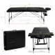 Adjustable 84-inch portable massage bed in black with headrest and armrests, ideal for spa and facial treatments.
