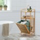 Natural bamboo laundry hamper with oxford fabric liner and open design for efficient storage in bathroom or bedroom.