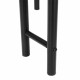 Close-up of the sturdy iron frame of the dining table set, showcasing the non-skid feet and horizontal support pipes.