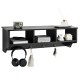 Wall-mounted black cubby organizer shelf with four hooks, ideal for entryway storage and displaying decor items.