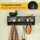 Wall-mounted black cubby organizer with 4 hooks, ideal for entryway storage and displaying items, holds 13 lbs total.