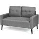 Modern gray loveseat sofa with soft cushion, solid rubber wood legs, ideal for living room or office seating.
