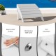 Folding ottoman in white HDPE material, designed for outdoor use, featuring a curved shape for leg relaxation.
