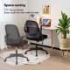Adjustable black mesh office chair with flip-up armrests, ergonomic backrest, and 360° swivel for versatile workspace.