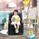 Kids recliner chair in blue with a cozy footrest and cushioned armrests, perfect for reading and relaxing.